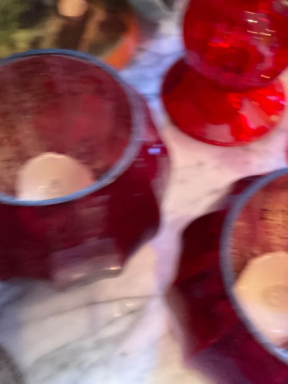 Set of lovely gathered red glass candlesticks, votive holders and vases